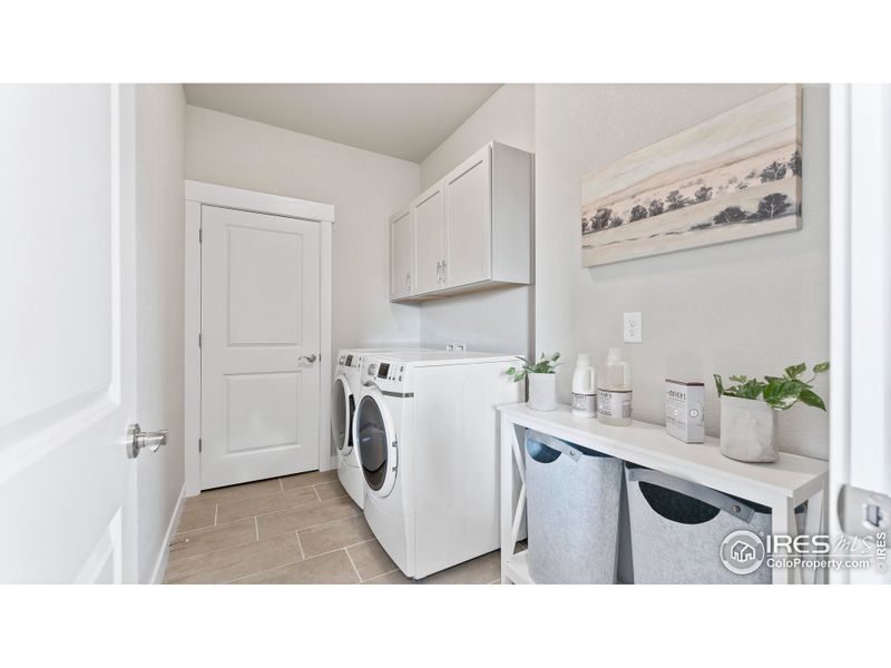 Large laundry room upstairs by all bedrooms