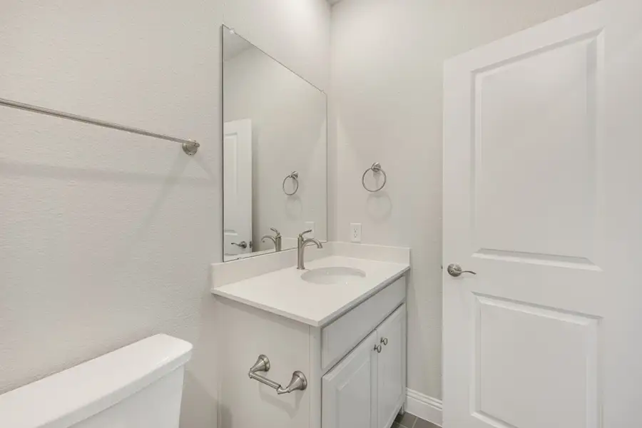 Furnished interior view inside a new home in Cottonwood Creek, Rowlett (Image 14).