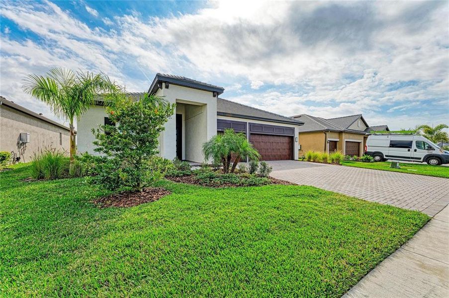 Front exterior of a new home in , Parrish, FL, highlighting curb appeal (Image 29).