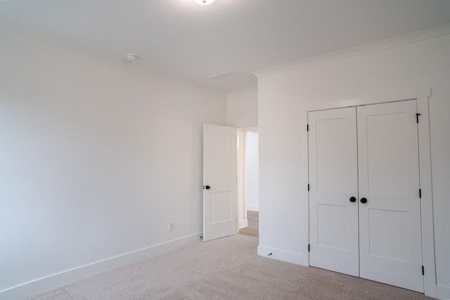 Spacious, unfurnished interior of a new home in Pinegate, Covington (Image 24).
