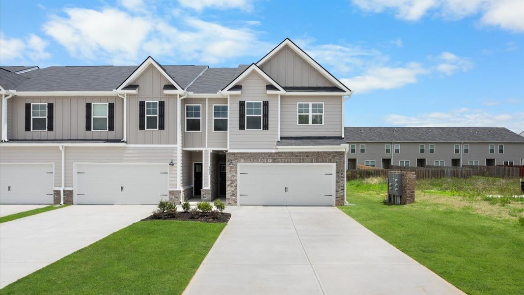 Representative exterior photo of a completed home built from the Sudbury by D.R. Horton in Laurel Park Townhomes, Hephzibah, GA (Image 1). Representative exterior photo of a completed home built from the Sudbury by D.R. Horton in Laurel Park Townhomes, Hephzibah, GA (Image 1).