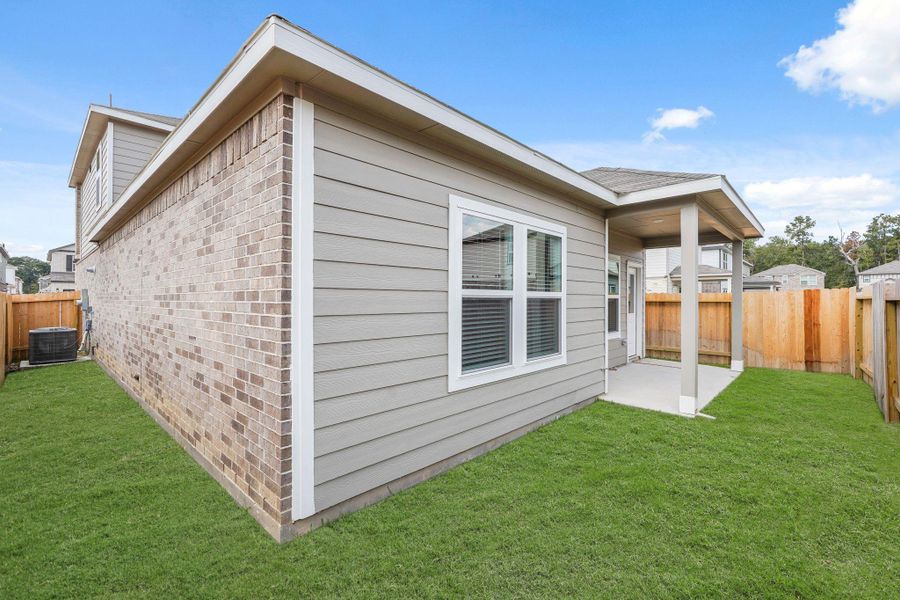 Exterior details and patio area of a home in Lakes at Black Oak, Magnolia (Image 4). Exterior details and patio area of a home in Lakes at Black Oak, Magnolia (Image 4).