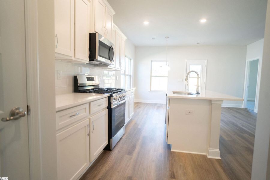 Furnished interior in a model home at Heritage Crossing in Simpsonville (Image 7).