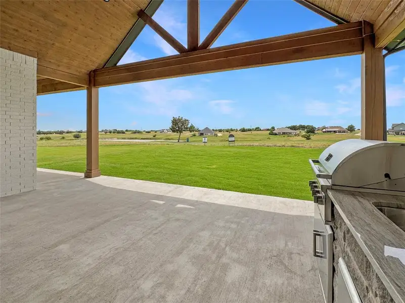 Exterior details and patio area of a home in The Retreat, Cleburne (Image 4).
