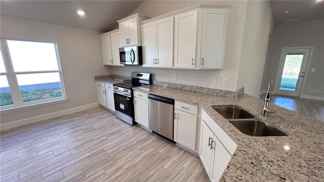 Furnished interior view inside a new home in Abbey Glen, Dade City (Image 5).