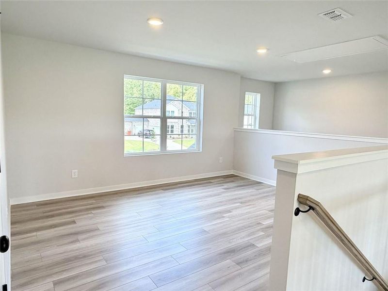 Spacious, unfurnished interior of a new home in Windsong Estates, McDonough (Image 12).