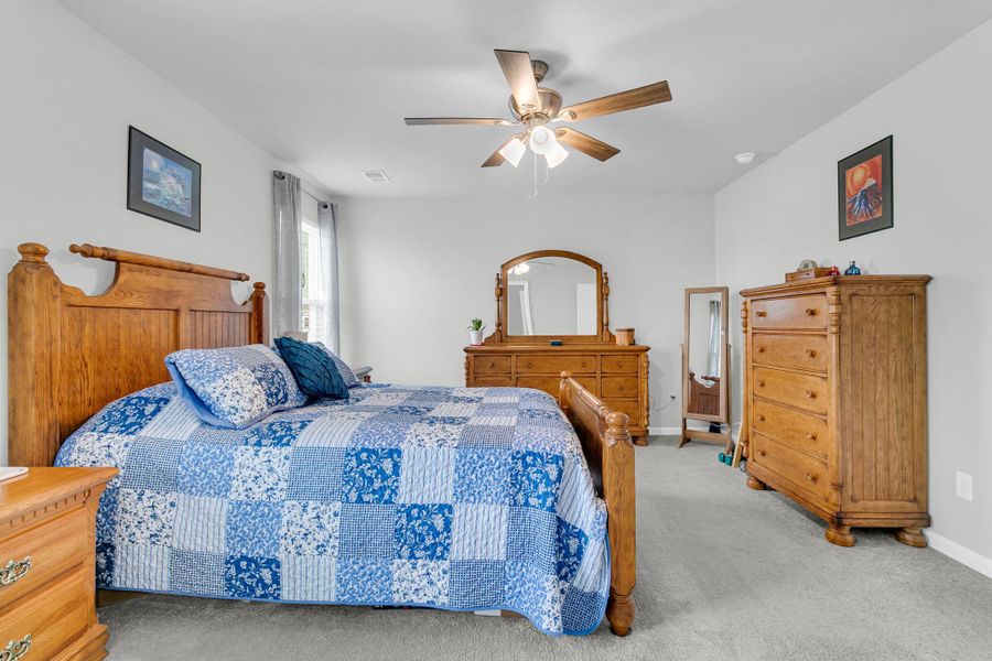 Furnished interior view inside a new home in Sweetgrass at Summers Corner, Summerville (Image 29).