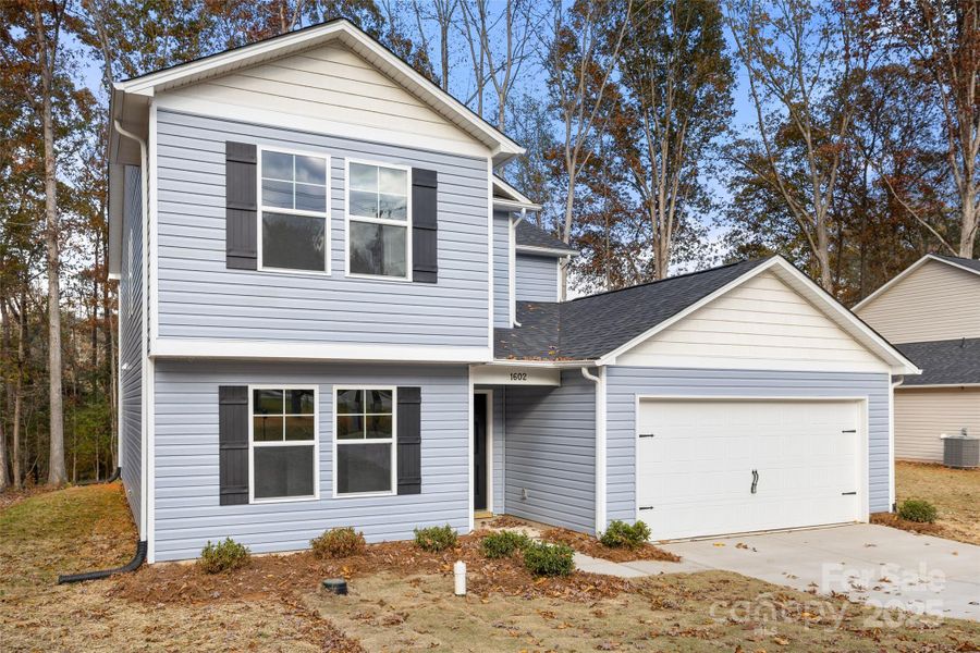 Front exterior of a new home in , Lancaster, SC, highlighting curb appeal (Image 16).