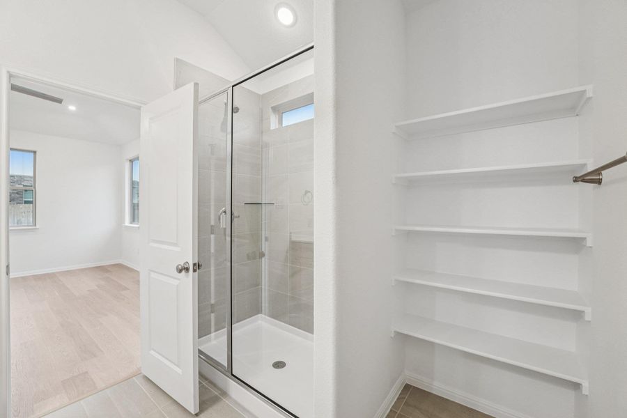 Furnished interior view inside a new home in Crosswinds, Kyle (Image 10).