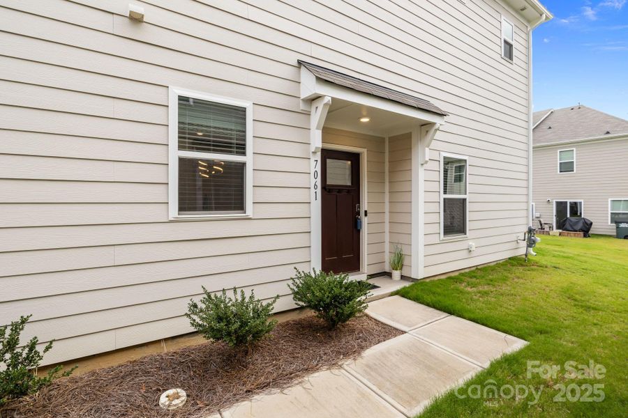 Exterior details and patio area of a home in , Charlotte (Image 4).