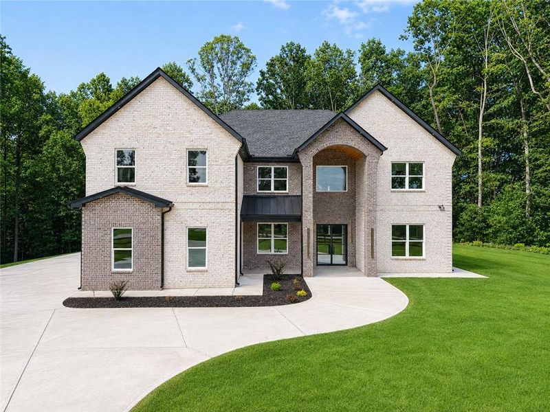 Front exterior of a new home in , Commerce, GA, highlighting curb appeal (Image 1). Front exterior of a new home in , Commerce, GA, highlighting curb appeal (Image 1).