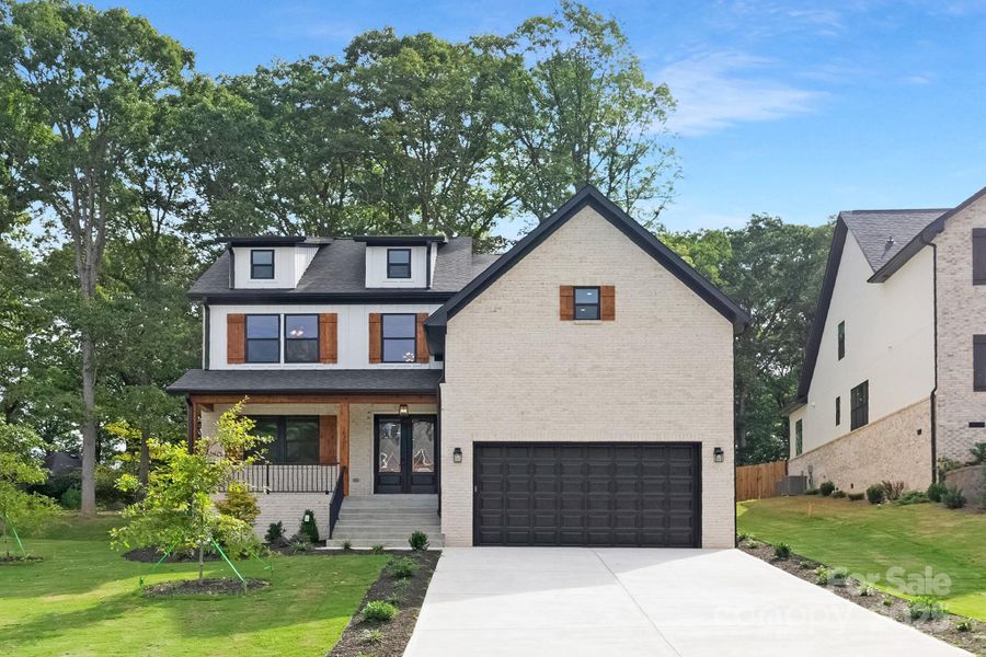 Front exterior of a new home in , Charlotte, NC, highlighting curb appeal (Image 17).