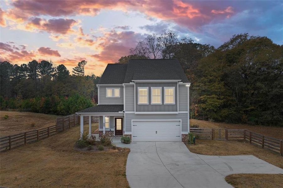 Front exterior of a new home in , Auburn, GA, highlighting curb appeal (Image 24).