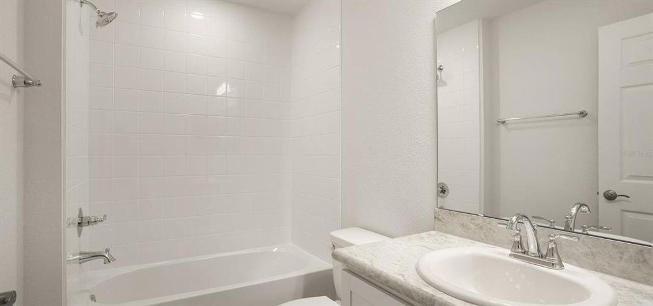 Furnished interior view inside a new home in Bennah Oaks, Belleview (Image 4).