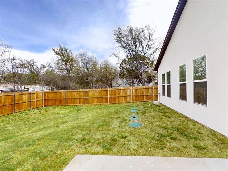 Exterior details and patio area of a home in , Granbury (Image 20).