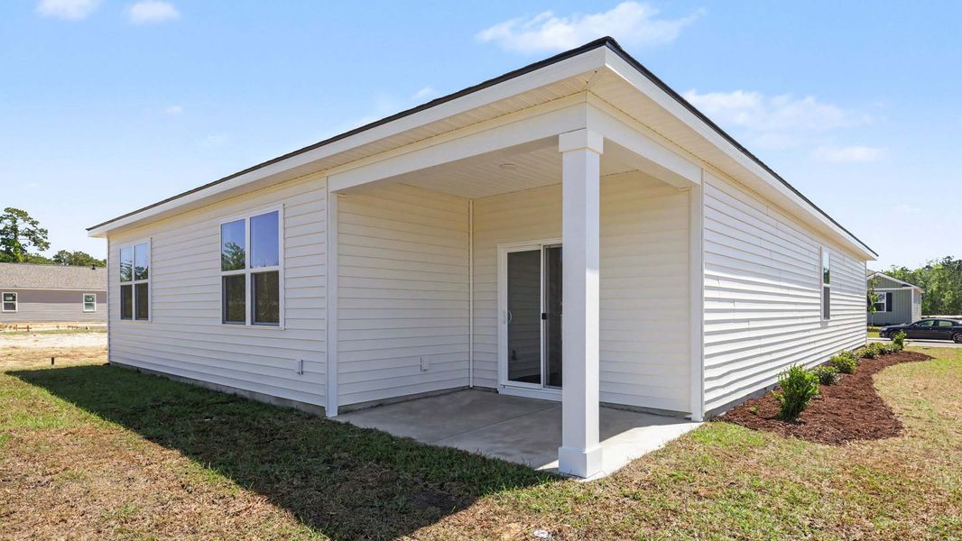 Exterior details and patio area of a home in Winfield Farms, Myrtle Beach (Image 3). Exterior details and patio area of a home in Winfield Farms, Myrtle Beach (Image 3).