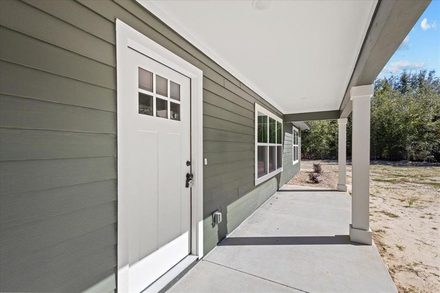 Exterior details and patio area of a home in , Bell (Image 22).