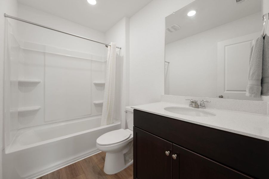 Furnished interior view inside a new home in Stoney Ridge, Del Valle (Image 19). Furnished interior view inside a new home in Stoney Ridge, Del Valle (Image 19).