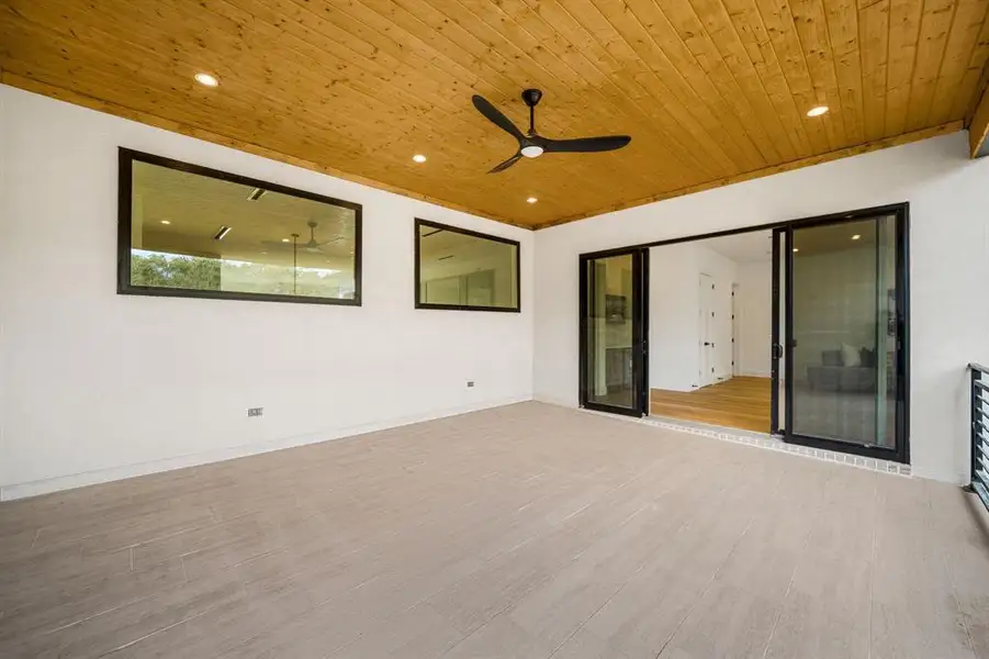 View of patio featuring a ceiling fan