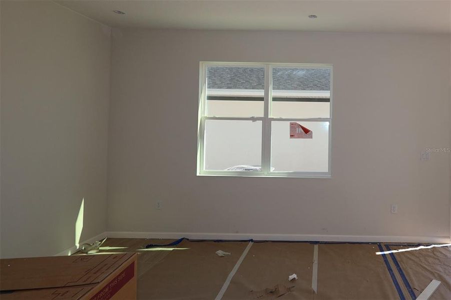 In-progress construction of a new home in Emerson Pointe, Apopka, FL (Image 14).