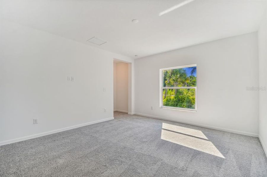Spacious, unfurnished interior of a new home in The Hammocks at West Port, Port Charlotte (Image 4).