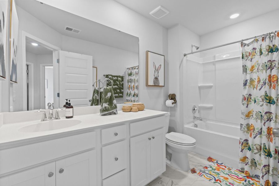 Furnished interior view inside a new home in Sweetgrass at Summers Corner, Summerville (Image 31).