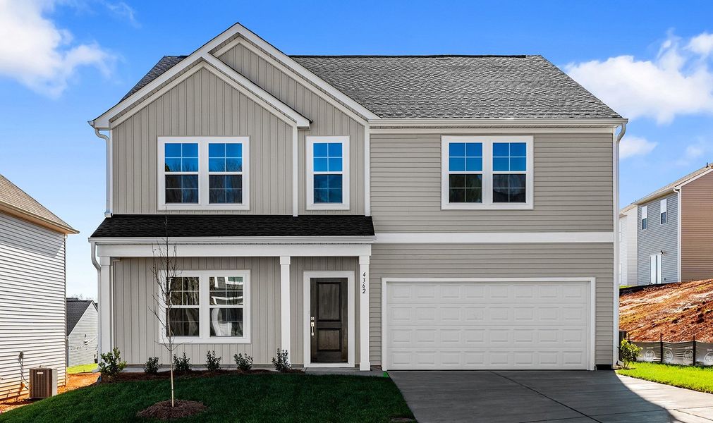 Front exterior of a new home in Hanes Lake, Winston-Salem, NC, highlighting curb appeal (Image 1).