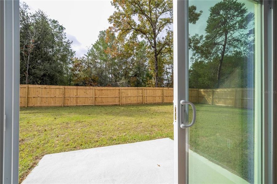 Exterior details and patio area of a home in , Ocklawaha (Image 3).