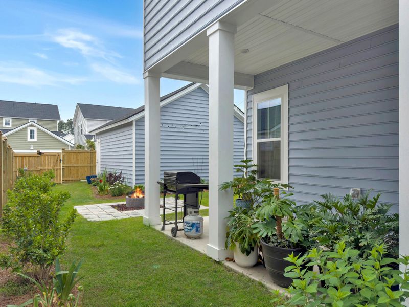 Exterior details and patio area of a home in Sweetgrass at Summers Corner, Summerville (Image 28). Exterior details and patio area of a home in Sweetgrass at Summers Corner, Summerville (Image 28).
