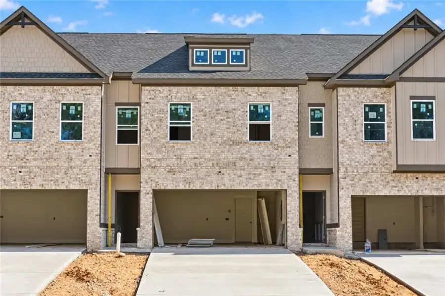 Front exterior of a new home in , Norcross, GA, highlighting curb appeal (Image 2). Front exterior of a new home in , Norcross, GA, highlighting curb appeal (Image 2).