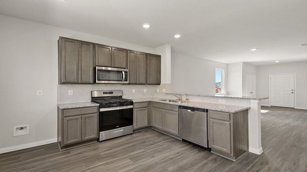 Furnished interior view inside a new home in Hunters Ranch, San Antonio (Image 7).