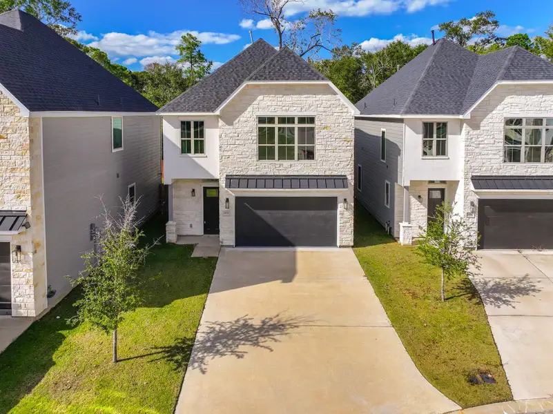 Front exterior of a new home in , Houston, TX, highlighting curb appeal (Image 1).