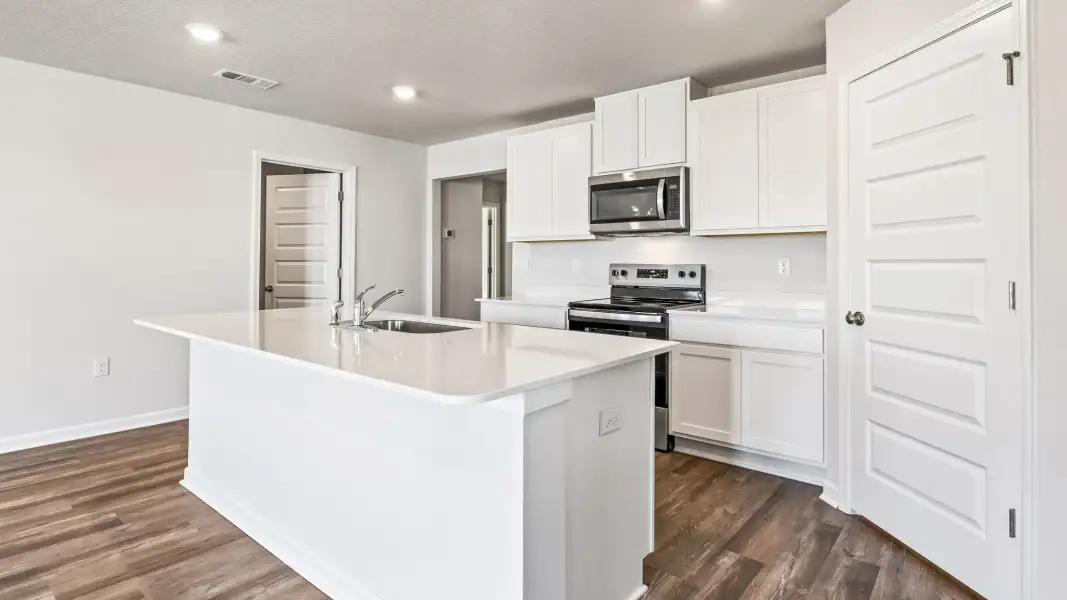 Representative furnished interior of a home built from the The Lismore by D.R. Horton in Magnolia at the Bluffs Phase 3, Freeport (Image 5).