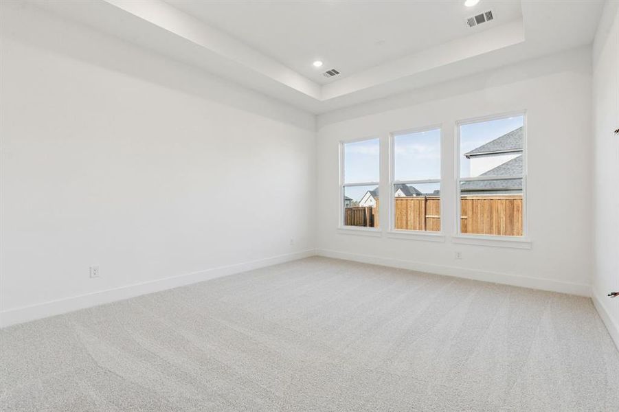 The peaceful owner's suite is located at the back of the home for additional privacy.