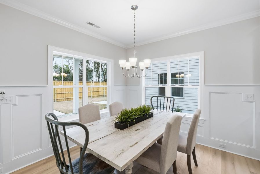 Representative furnished interior of a home built from the Kauai by Bill Clark Homes in The Sanctuary at Sunset Beach, Sunset Beach (Image 15).