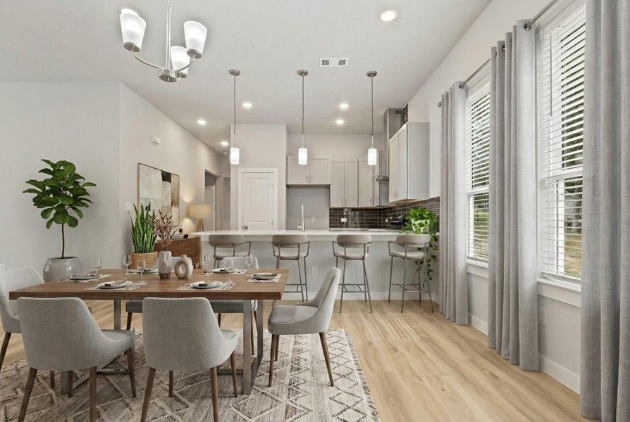 View of dining area, virtually staged to show all the possiblities.