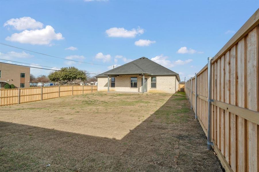 Exterior details and patio area of a home in , Grand Prairie (Image 25).
