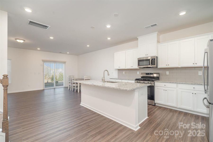 Open living dining & kitchen Open living dining & kitchen