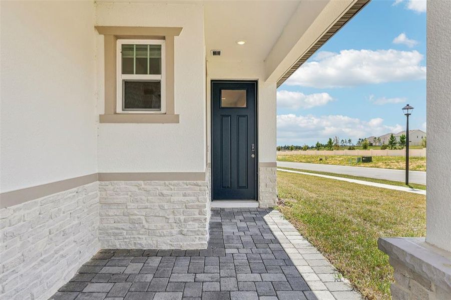 Exterior details and patio area of a home in Cyrene at Minneola, Minneola (Image 3).