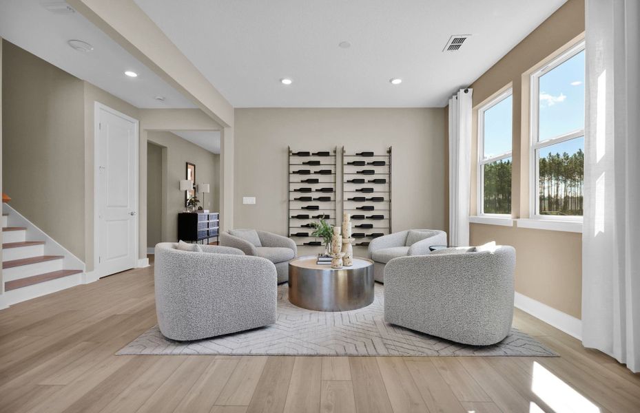 Furnished interior in a model home at Westerly Park at Wildlight in Wildlight (Image 6). Furnished interior in a model home at Westerly Park at Wildlight in Wildlight (Image 6).