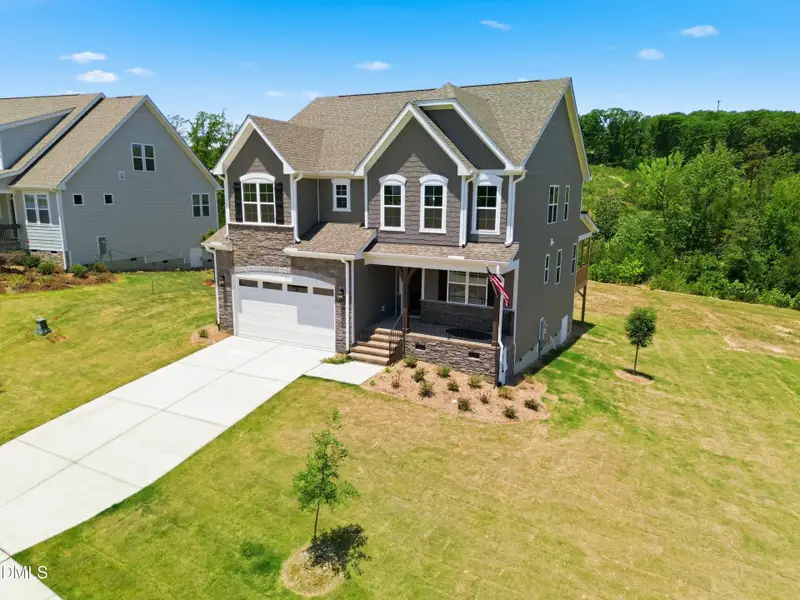 Front exterior of a new home in The View, Durham, NC, highlighting curb appeal (Image 24).