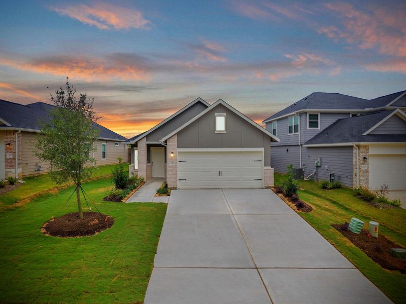 Front exterior of a new home in Westridge Cove, Conroe, TX, highlighting curb appeal (Image 20).