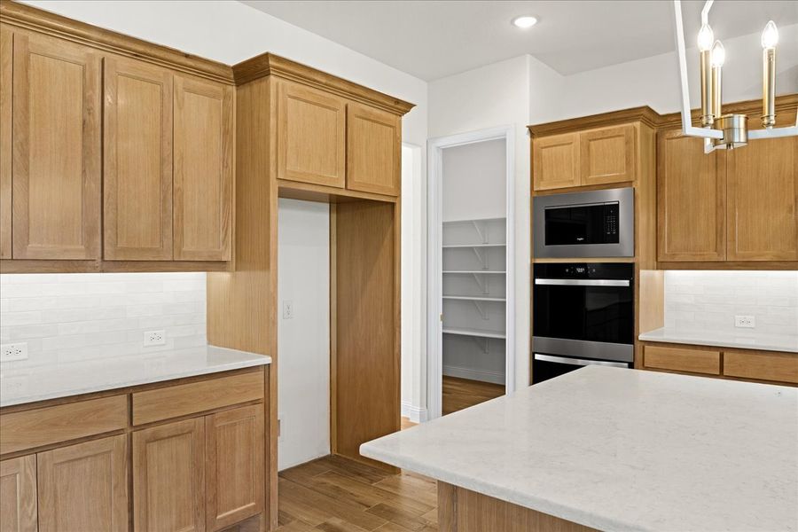 Representative furnished interior of a home built from the The Braden II by Doug Parr Custom Homes in Kessler Farms, Brock (Image 11).