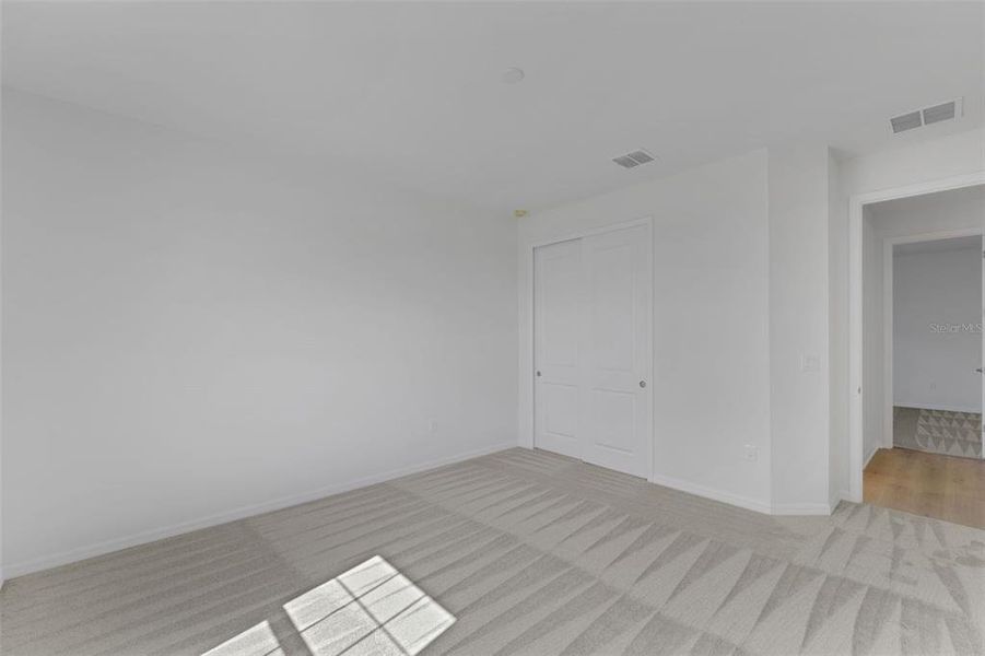 Spacious, unfurnished interior of a new home in Creekside Run at Babcock Ranch, Punta Gorda (Image 31). Spacious, unfurnished interior of a new home in Creekside Run at Babcock Ranch, Punta Gorda (Image 31).