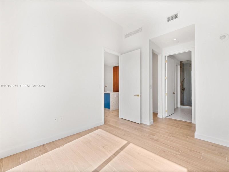 Spacious, unfurnished interior of a new home in Mr. C Residences, Miami (Image 35).