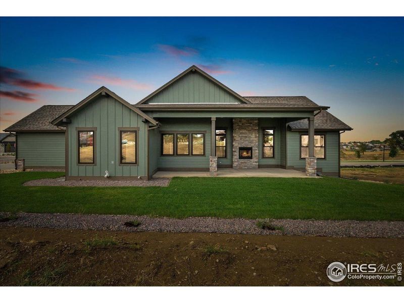 Front exterior of a new home in , Berthoud, CO, highlighting curb appeal (Image 1).