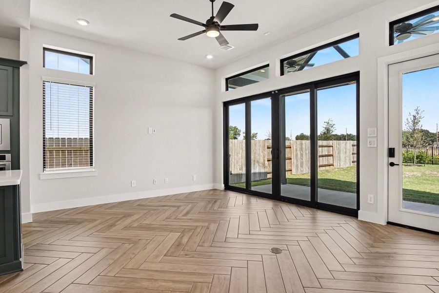 Great room has floor outlet installed and view of backyard. Great room has floor outlet installed and view of backyard.