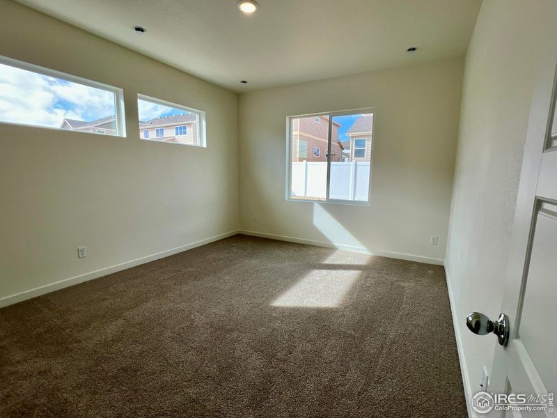 Spacious, unfurnished interior of a new home in Union Colony West, Greeley (Image 11).