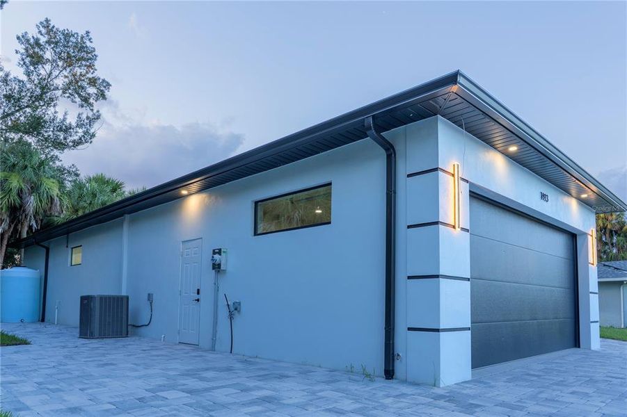 Front exterior of a new home in , North Port, FL, highlighting curb appeal (Image 25).
