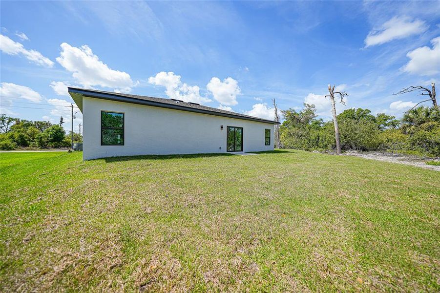 Exterior details and patio area of a home in , Port Charlotte (Image 3).